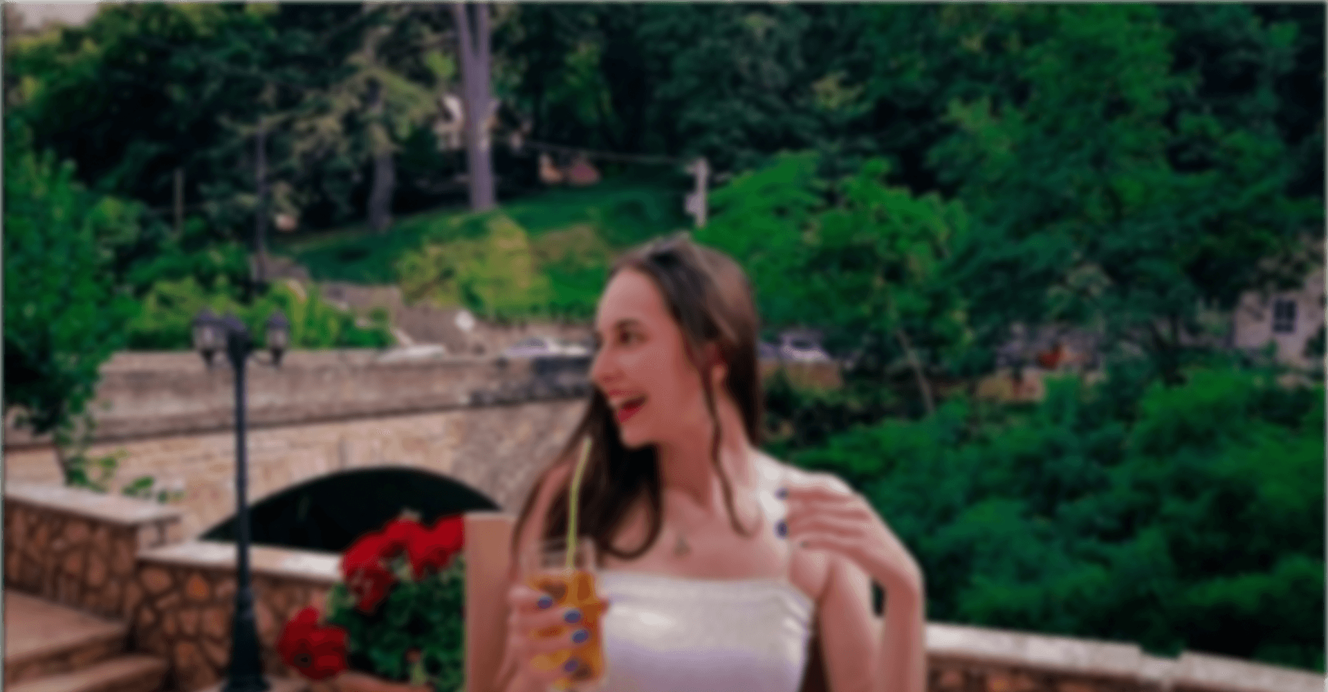 A picture of a nice green scenery and Evgenija Jovanova starring to the left (where the house on the homepage is located).