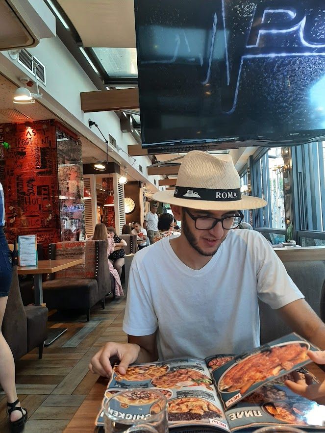 beautiful man in a restaurant